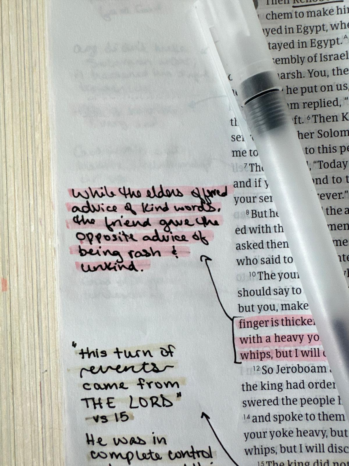 Gel pen on Bible with text closeup