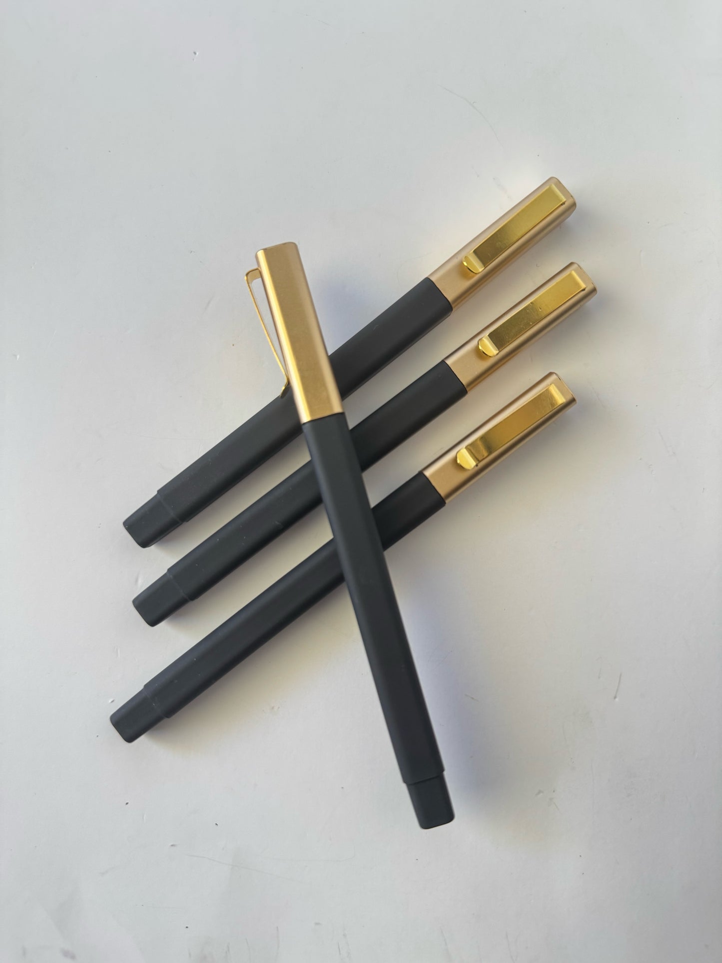Black Pen with Gold Cap